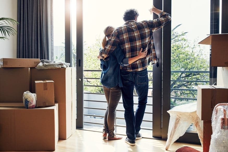 young couple moving into new home