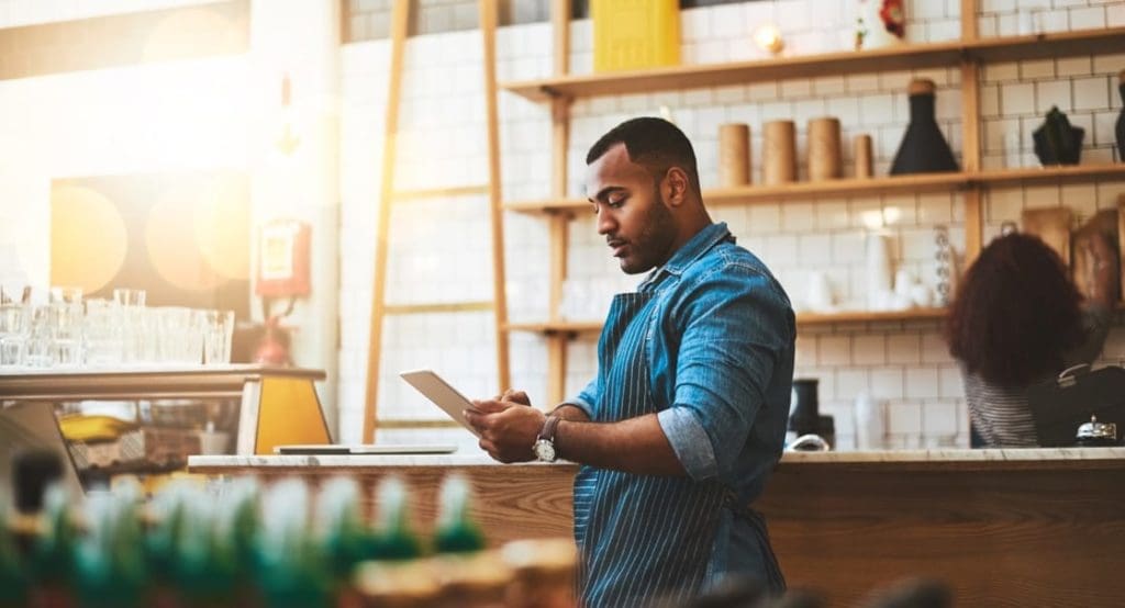man working in a small business