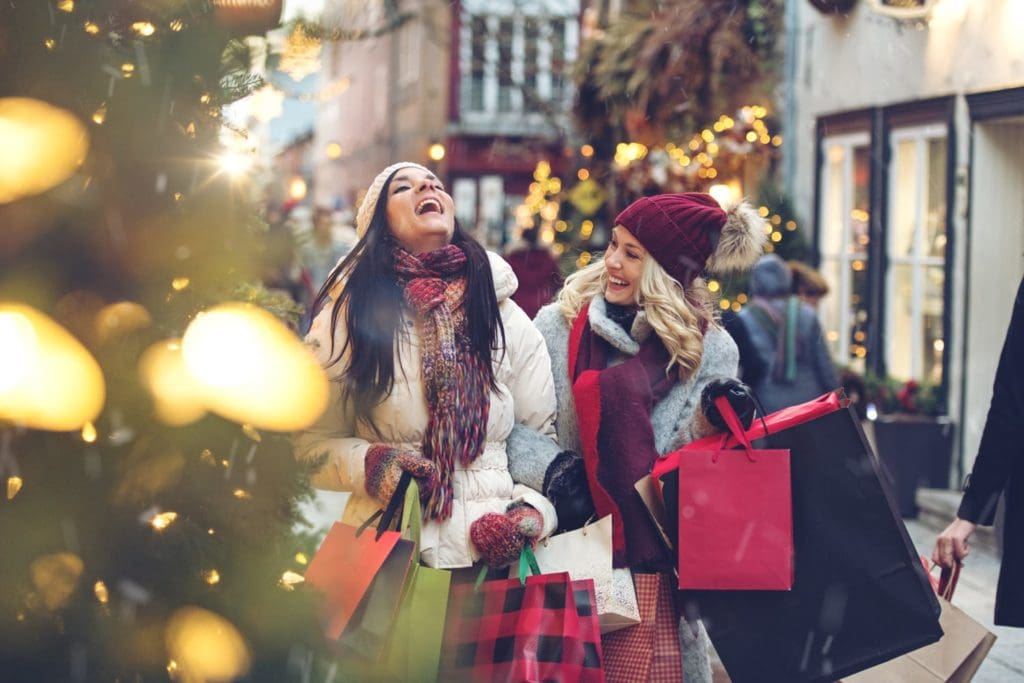 women shopping for holdiay gifts