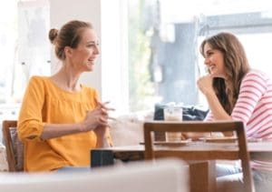 step 3 women sitting at table