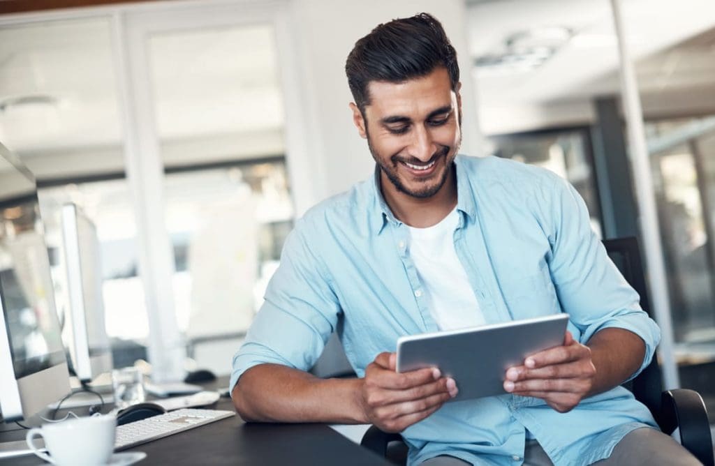 man using tablet device